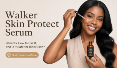 Black woman holding Walker Skin Protect Serum with dropper, featured image for a blog about benefits, how to use it, and whether it is safe for Black skin